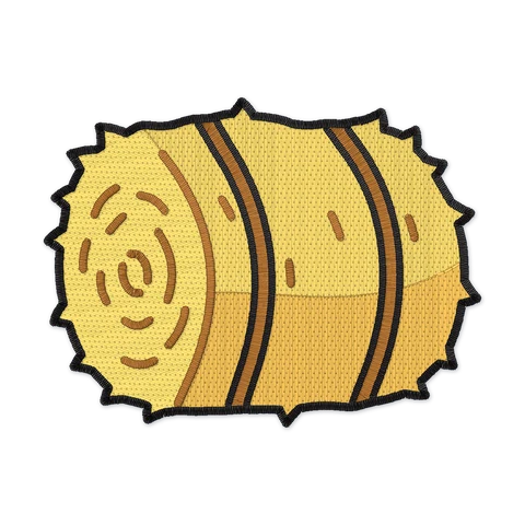 Stickdatei mit einem runden strohgoldenen Heuballen mit zotteligen Büscheln, zwei braunen Schnüren und Strichringen auf der Stirnseite