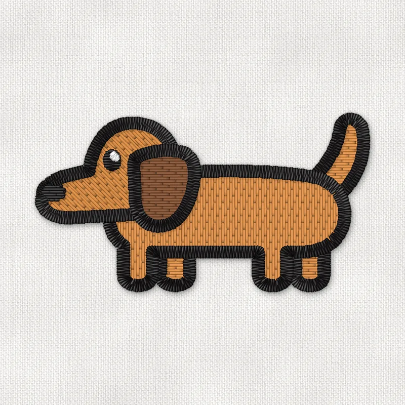 Motif de broderie machine d'un petit teckel caramel, vu de profil, avec une oreille chocolat tombante et la queue dressée