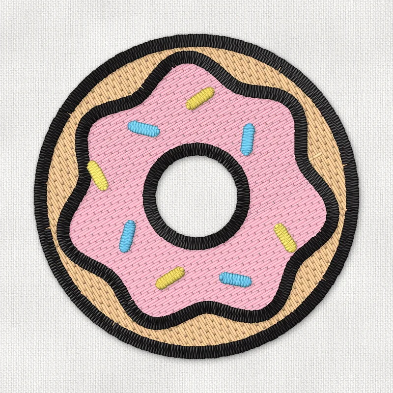 Broderifil med en donut med lyserød glasur og gult og blåt krymmel